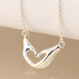 Heart Shaped Hands Necklace