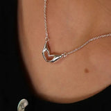Heart Shaped Hands Necklace