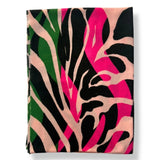 Colorful abstract patterned fabric on a white background