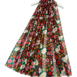 Green scarf with colourful daisies