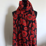 Red poppy on black background scarf