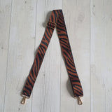 Brown & black zebra print bag strap