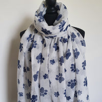 White scarf with blue paw prints