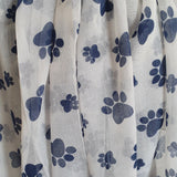 White scarf with blue paw prints